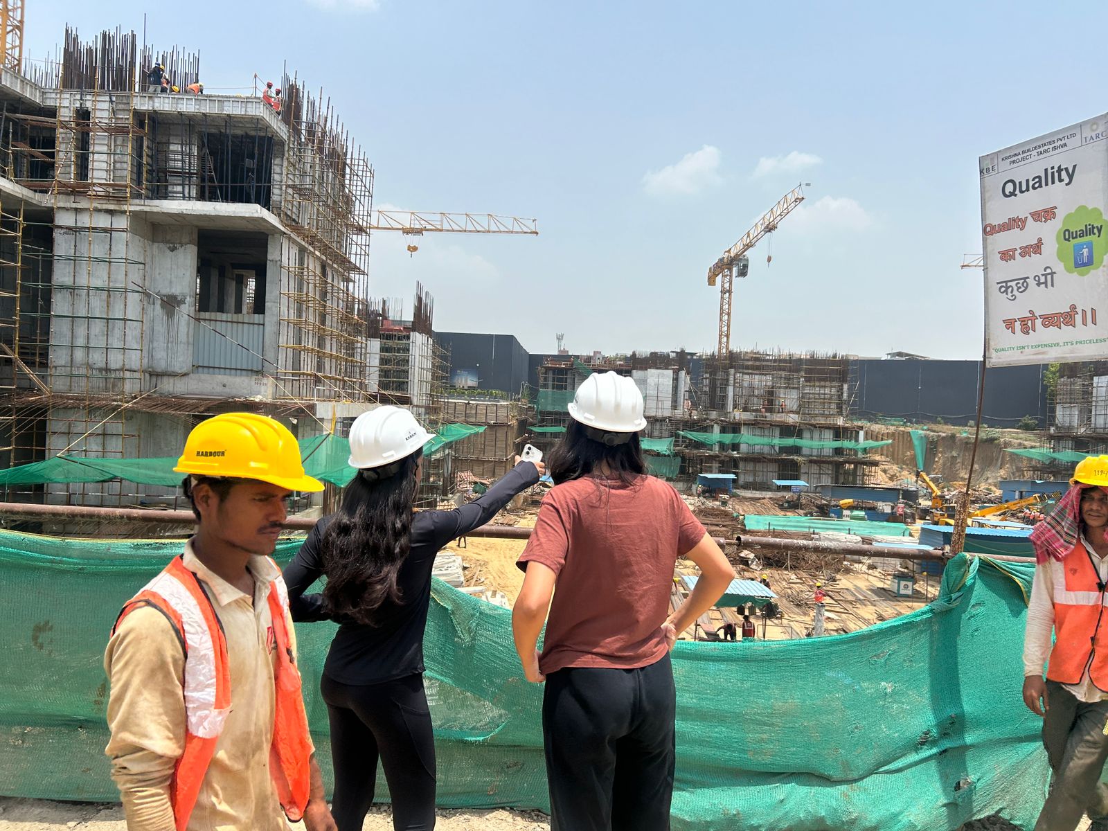 NirmaanSetu volunteers at a construction site survey